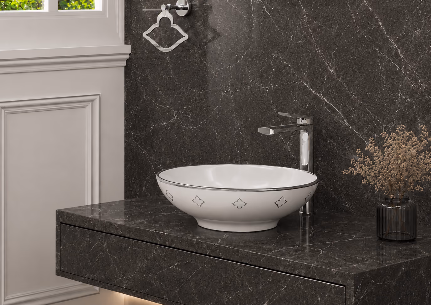 FK01 white oval countertop basin with silver rim and motifs on a dark marble vanity
