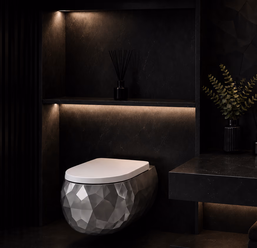 Pent wall-hung water closet with faceted grey body and white seat in a dark bathroom